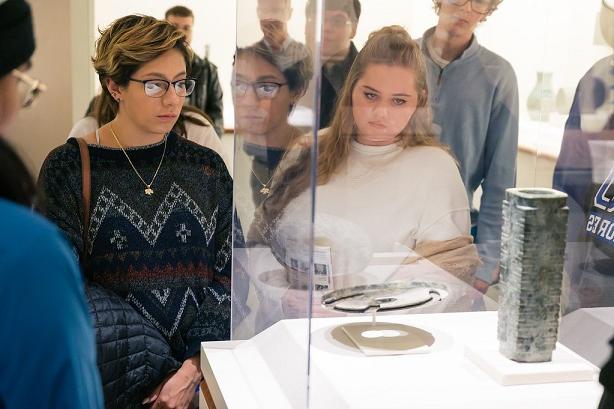 Students looking at a display